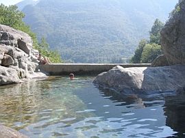 bathing in the Maggia waterfall behind Casa alla Cascata